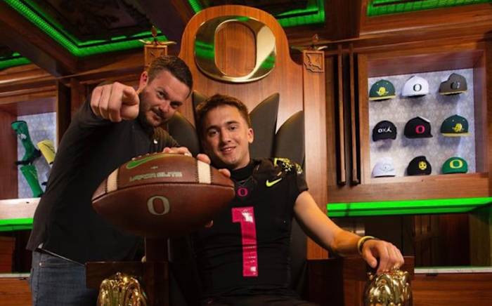 Luke Moga poses with Dan Lanning.